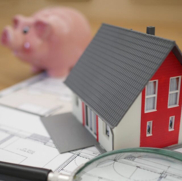 Cost of living house and piggybank